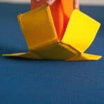 A photo showing the velcro at the end of a Fun Stick as it's being placed onto a carpet floor surface.