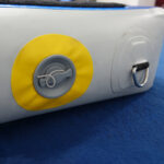 A closeup of the corner of the Power Launch, showing the valve and a D-ring.