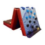 A photo of the Climbing Wall Overlay on top of mats, in a "V" shape.