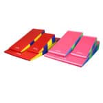 A photo of the Folding Incline Mats. All three sizes are shown in both Bright Pastel and Primary Rainbow designs.