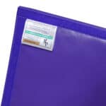 A closeup of the bottom of a Build-A-Mat, showing the velcro at the edges.