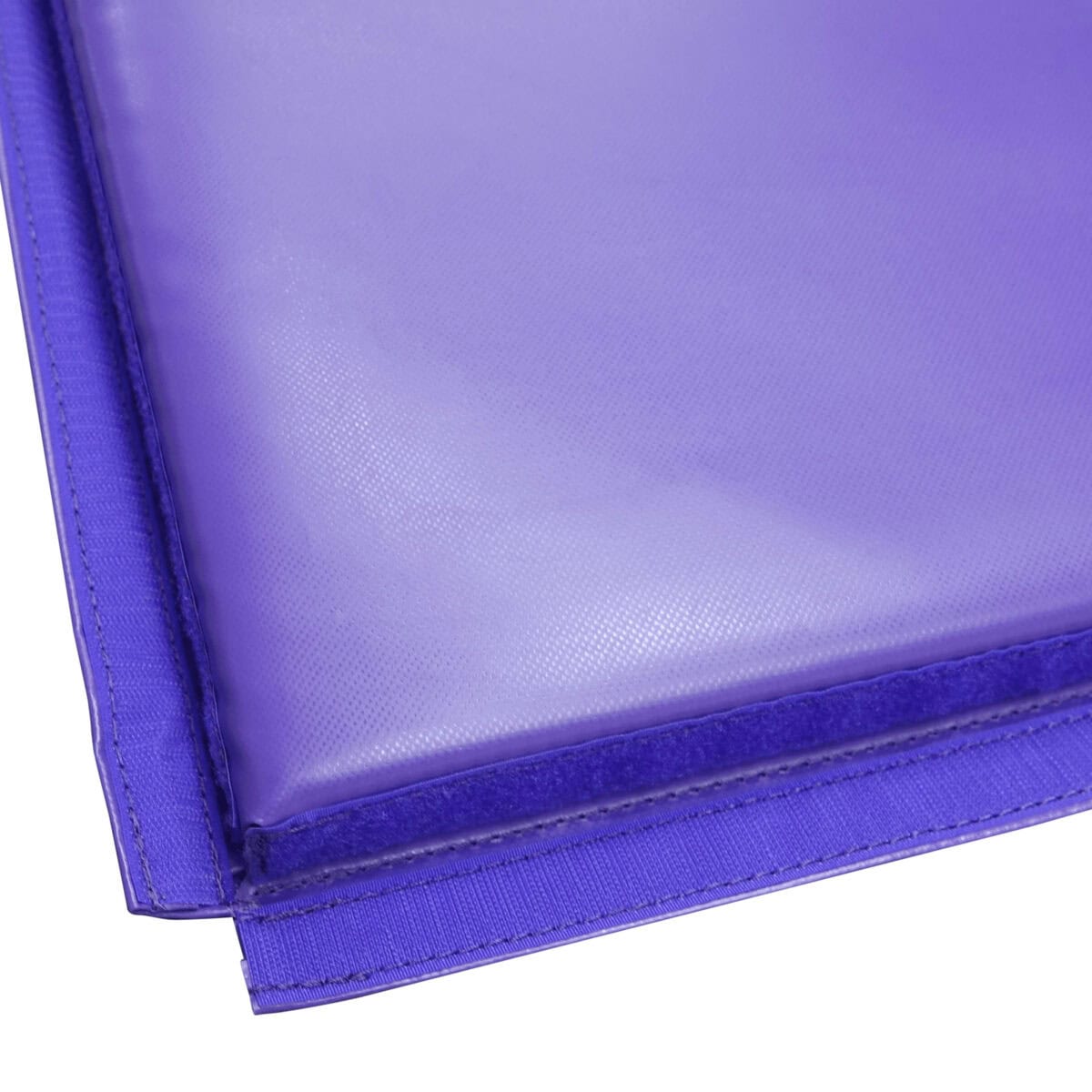 A closeup of the bottom of a Build-A-Mat, showing the velcro flaps on the sides.